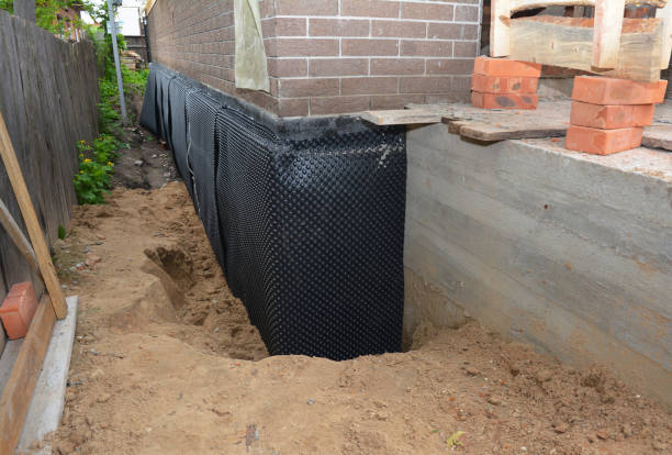 Happy homeowners after waterproofing job in Bowmansville